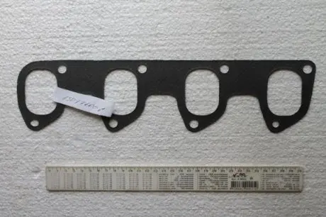 Прокладка коллектора in (паронит) 1.8td AJUSA 13077600