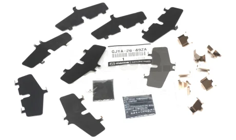 Комплект накладок антискрип задних тормозных колодок MAZDA GJYA2649ZA